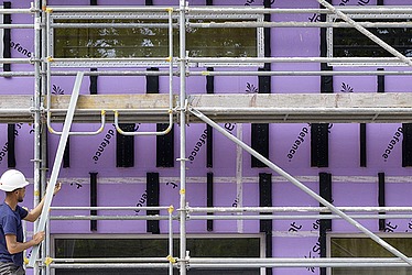 Visuel d'illustration de la page mieux économiser l'énergie, avec une photo représentant des travaux d'illustration d'une école à Pantin